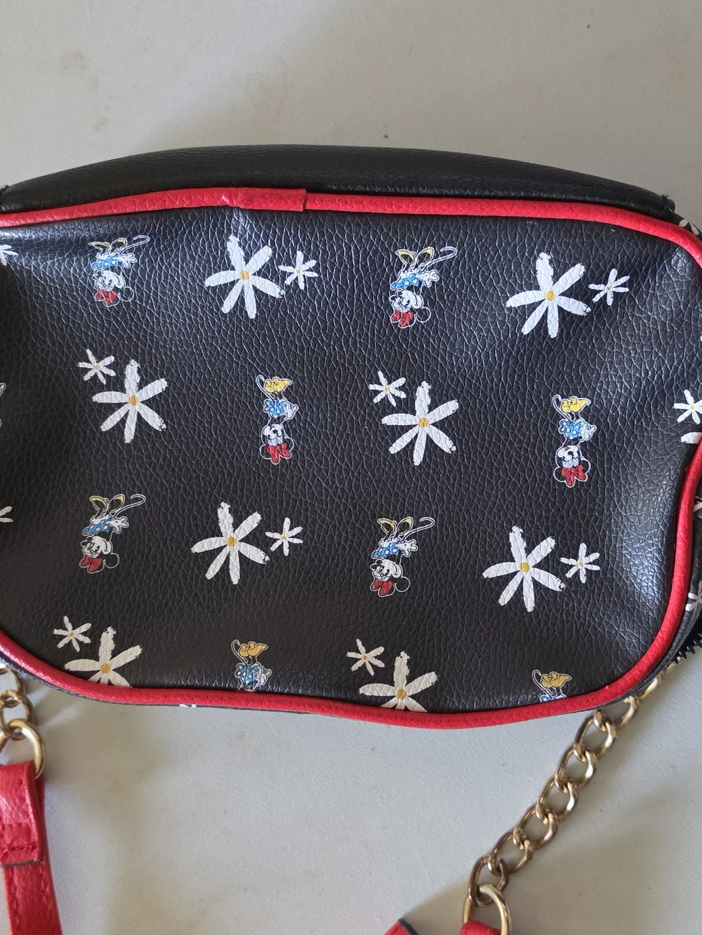 Disney Minnie Mouse Black Crossbody Bag with Red Trim and Daisy Print